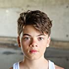 Brecken Merrill به عنوان Tate Dutton